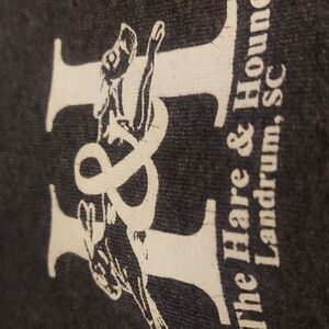 Dope retro graphics on rando neighborhood bar tee. Dbl sided. Ultra soft.